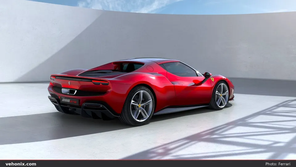 2026 Ferrari 296 GTB in red, rear three-quarter studio view