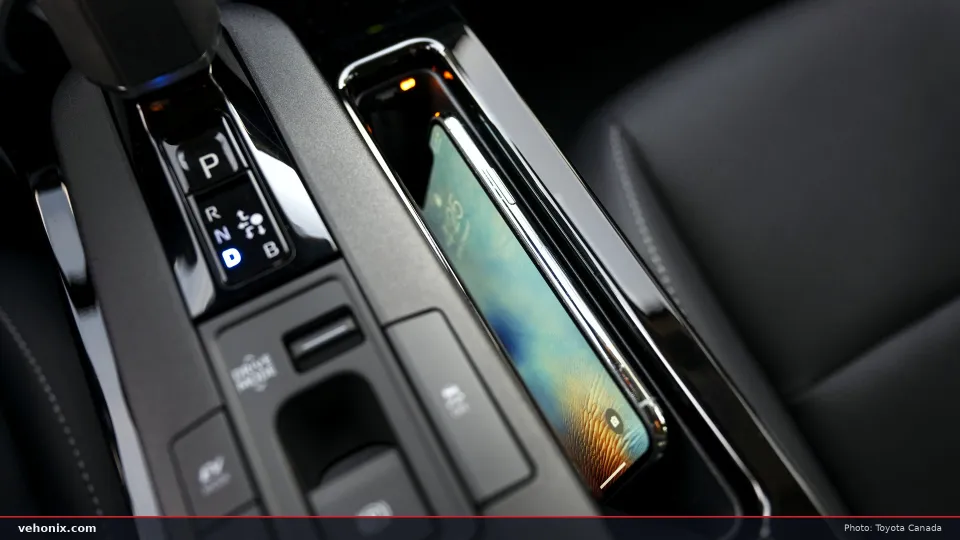 2026 Toyota Prius Limited close-up of the shifter and wireless charging pad