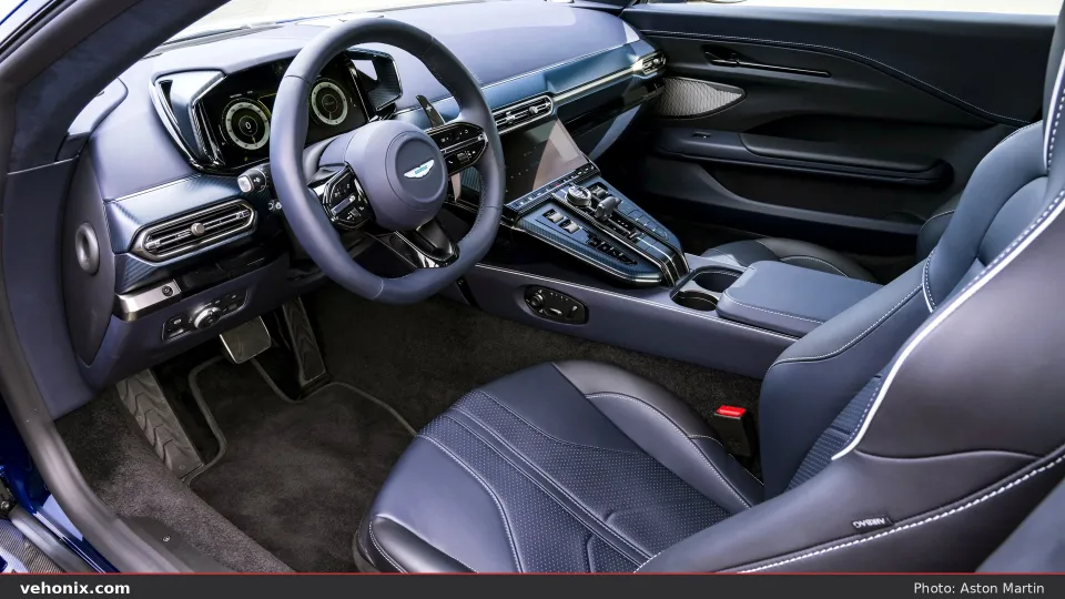 2026 Aston Martin Vantage cabin with navy leather seats, white stitching and carbon-fibre trim