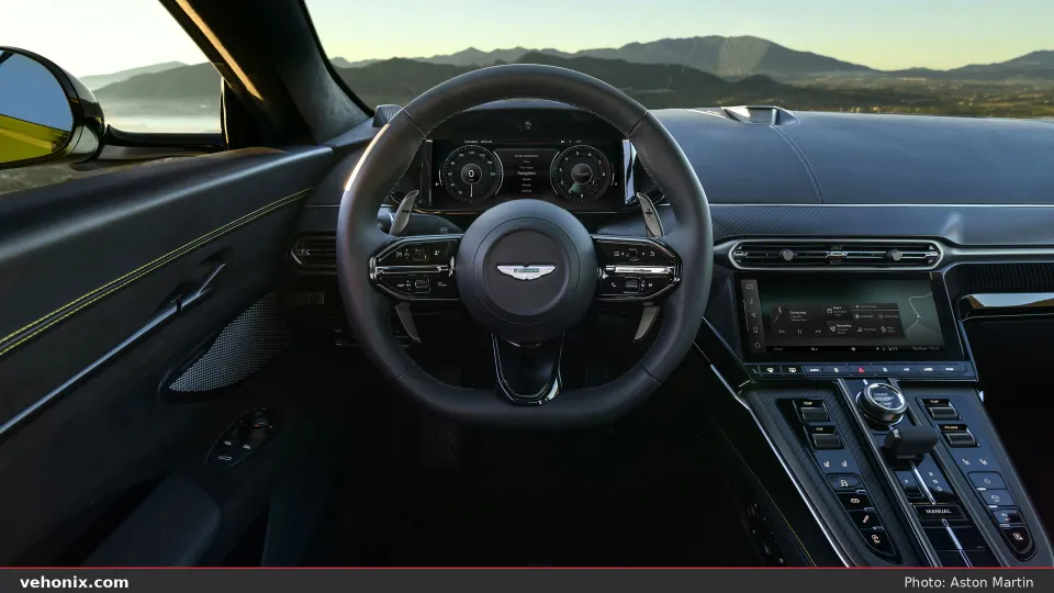 2026 Aston Martin Vantage driver cockpit with black leather, yellow stitching and dual screens