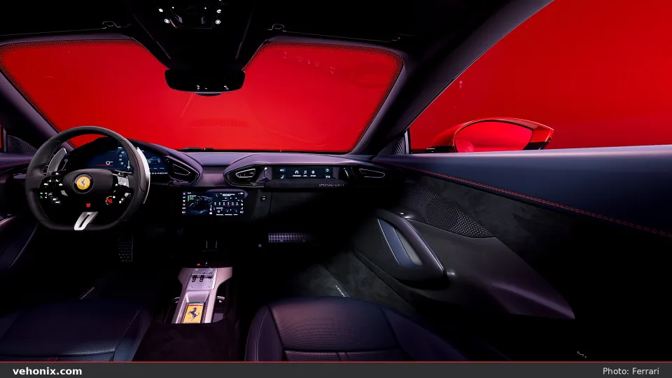 2026 Ferrari 12Cilindri driver cockpit with red ambient light through glass