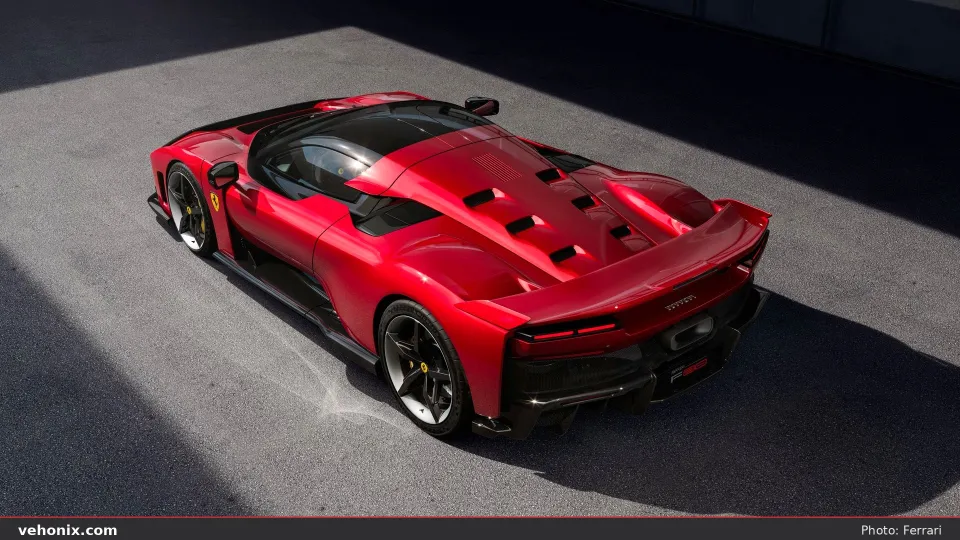 2026 Ferrari F80 in Rosso, high-angle rear three-quarter view