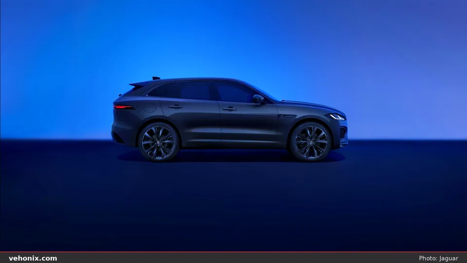 2026 Jaguar F-Pace dark grey side-profile exterior in blue studio