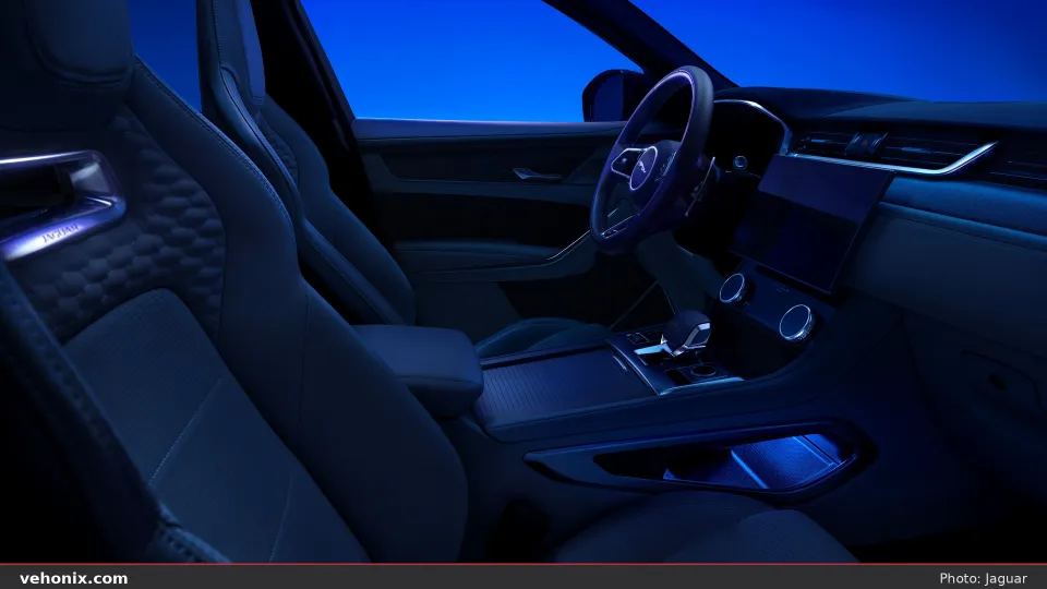 2026 Jaguar F-Pace interior dash, wheel and quilted seats in blue light