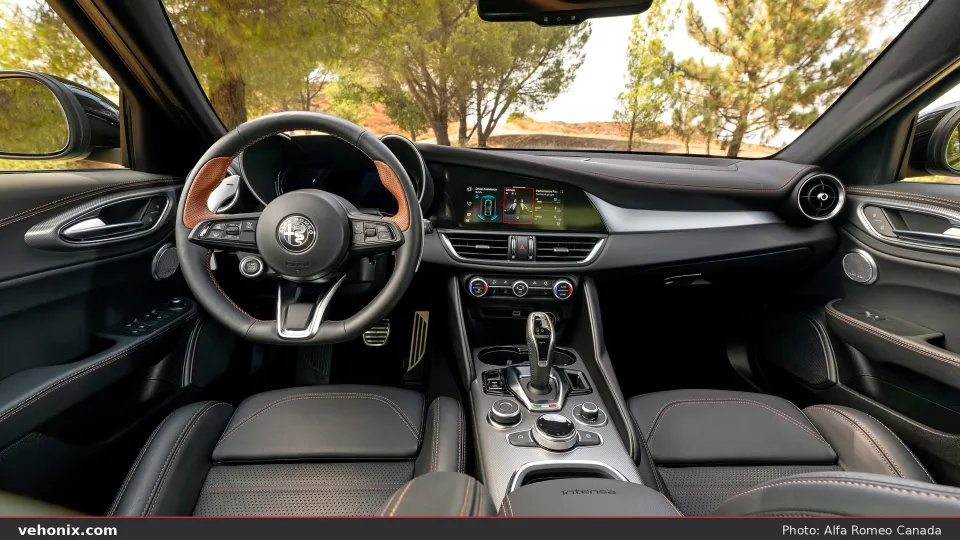 2026 Alfa Romeo Giulia Intensa cabin with black leather seats and tan stitching