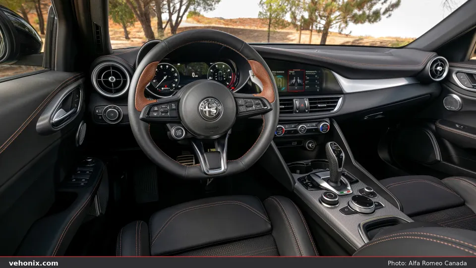 2026 Alfa Romeo Giulia Intensa dashboard, steering wheel and front seats from the cabin