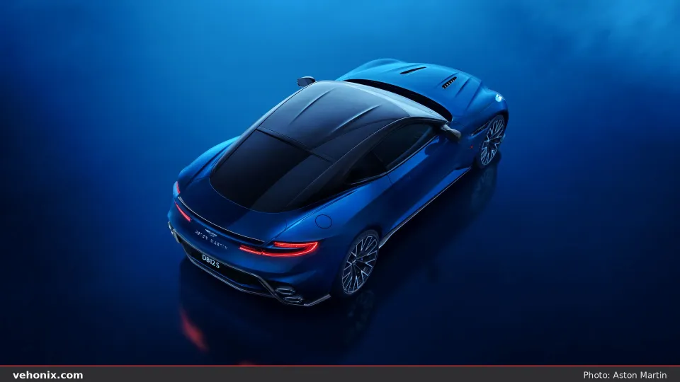 2026 Aston Martin DB12 S in dark blue, high-angle rear three-quarter studio view