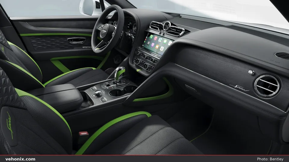 2026 Bentley Bentayga cockpit with black leather and lime-green contrast accents