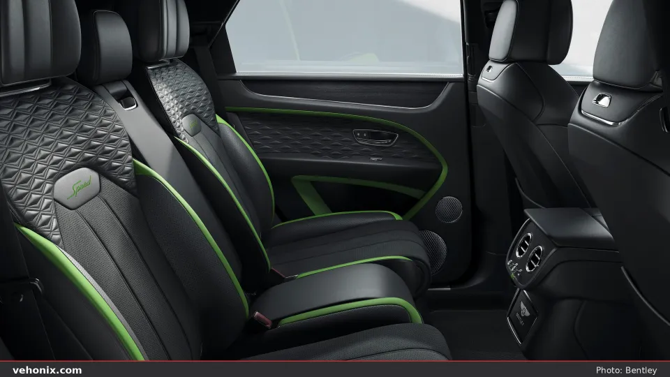 2026 Bentley Bentayga rear seats in quilted dark leather with lime-green piping