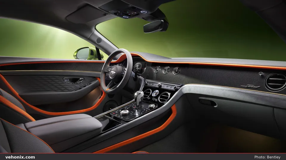 2026 Bentley Continental GT cockpit with dark grey leather and orange accents