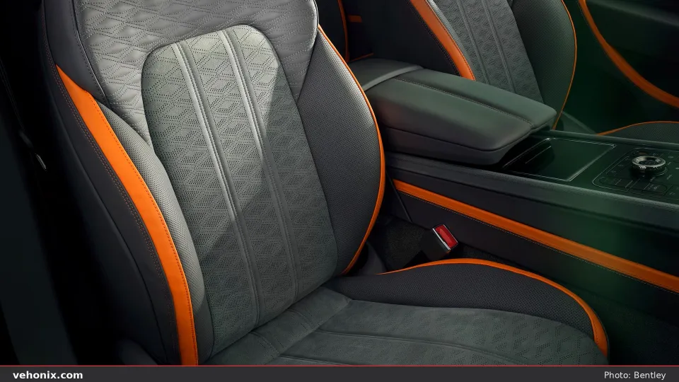 2026 Bentley Continental GT front seat in dark grey quilted leather with orange trim