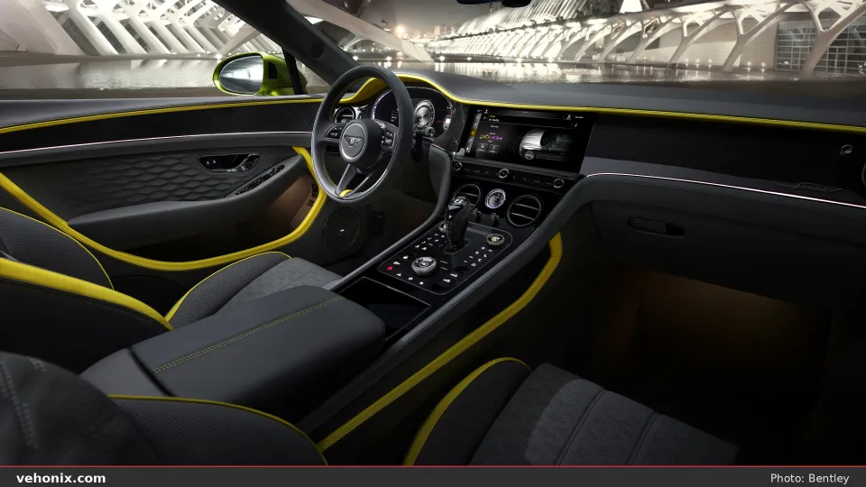 2026 Bentley Continental GT Convertible cockpit with dark leather and lime accents