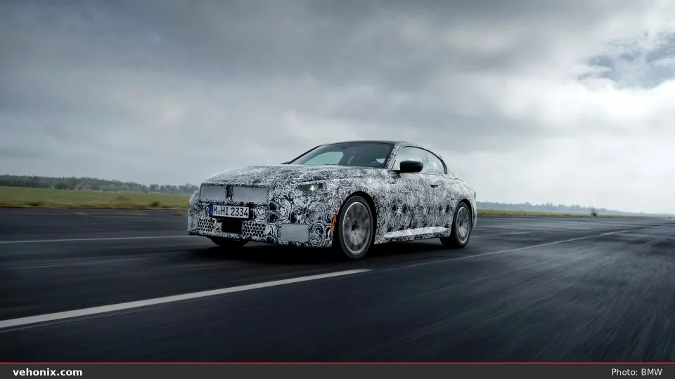 2026 BMW 230i xDrive in blue, exterior view