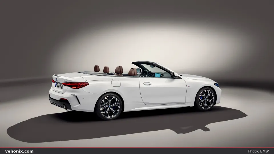 2026 BMW 430i xDrive Convertible in black, studio view
