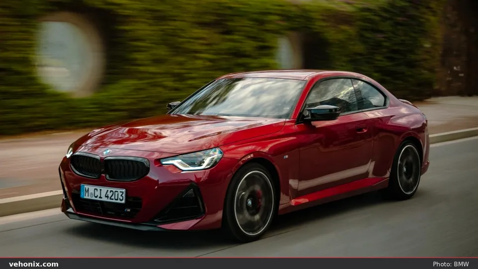 2026 BMW i4 xDrive40 Gran Coupe in red, exterior view