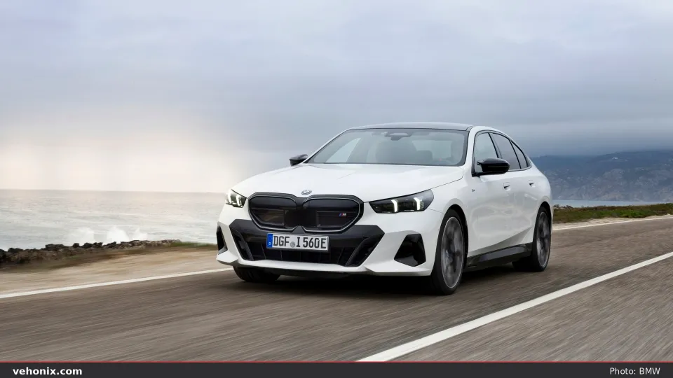 2026 BMW i5 M60 xDrive in blue, on-location view