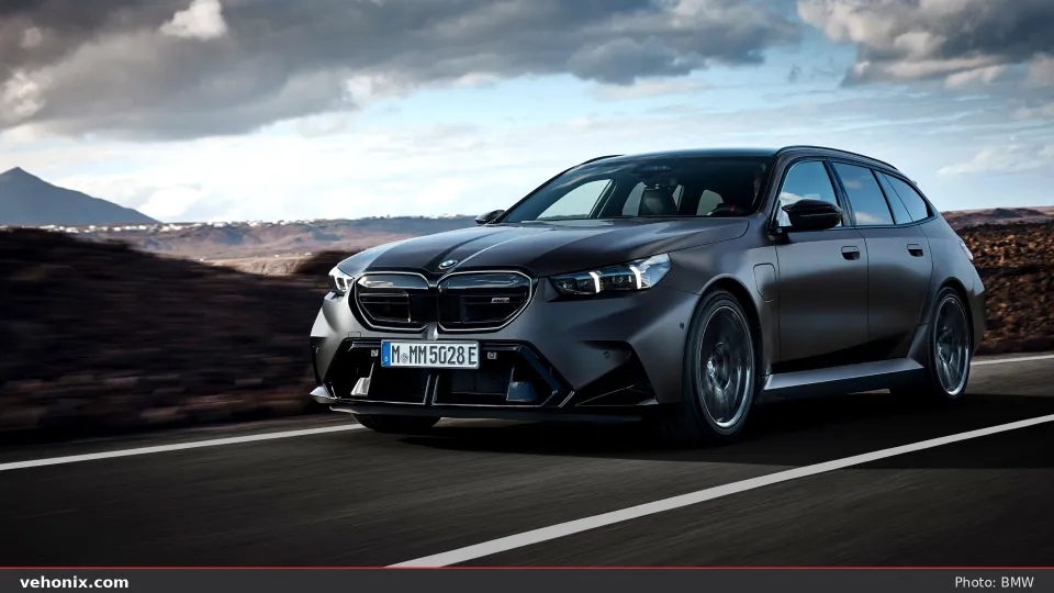 2026 BMW M5 Touring in blue, exterior view
