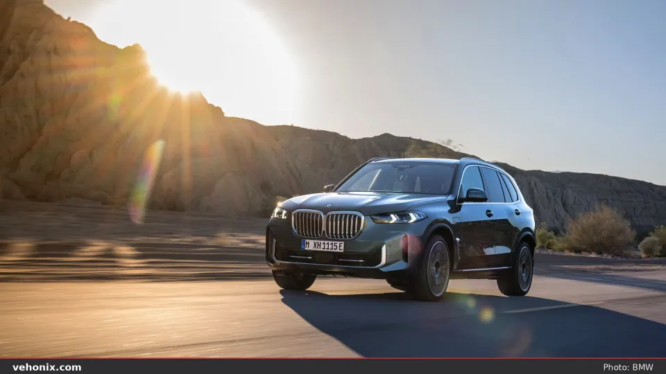 2026 BMW X5 xDrive50e in red, exterior view