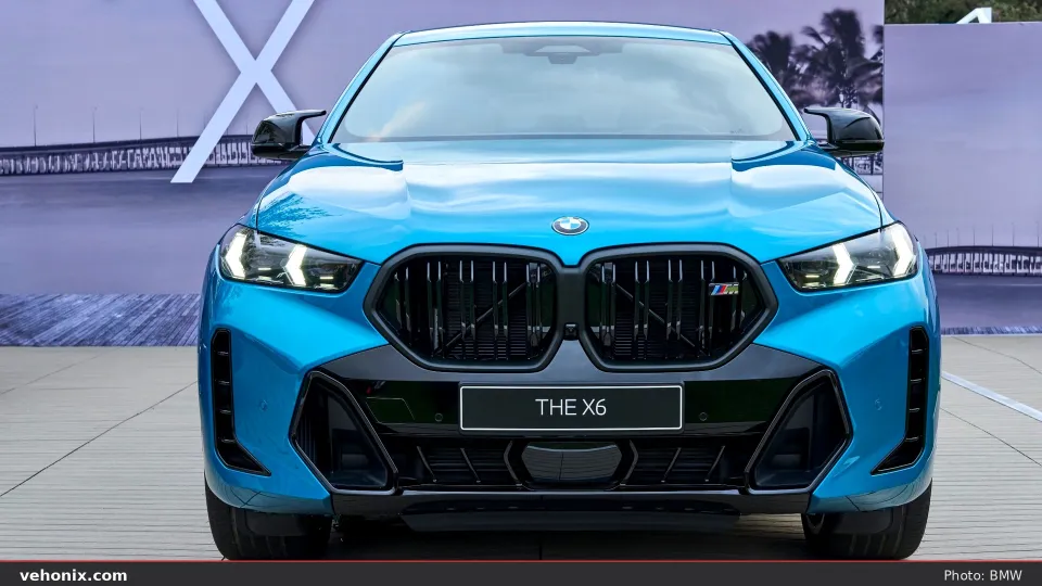 2026 BMW X6 M60i xDrive in blue, exterior view