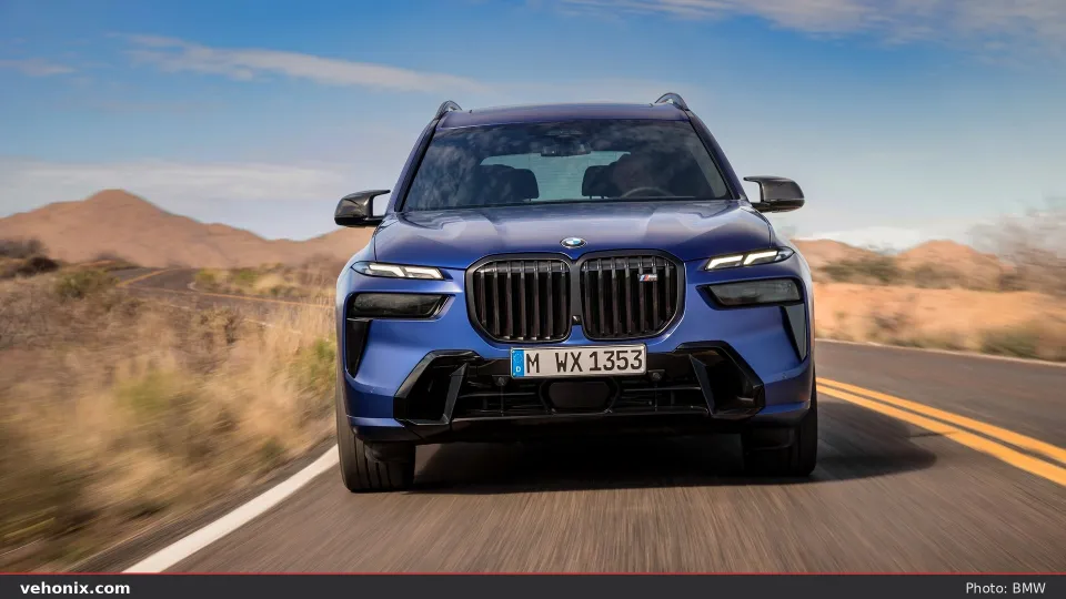 2026 BMW X7 M60i xDrive in red, exterior view
