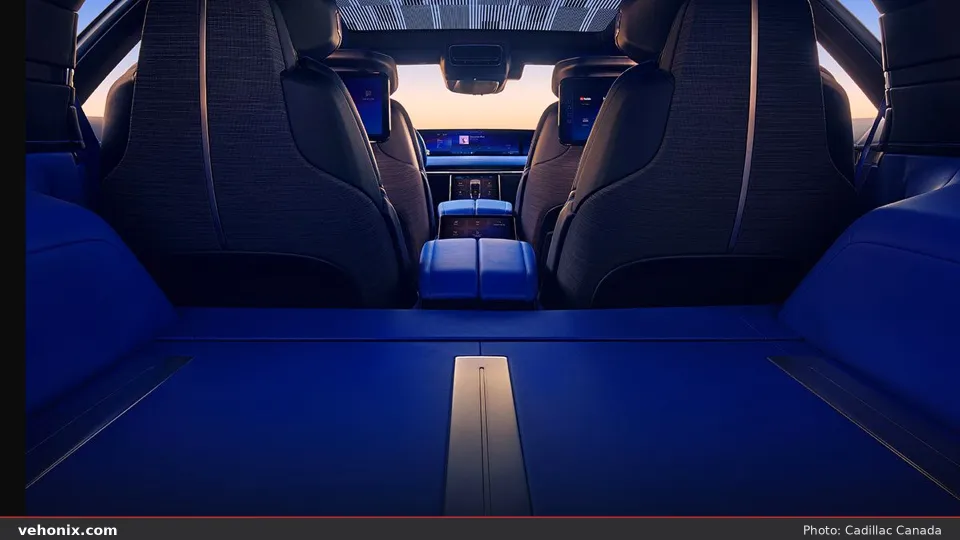 2026 Cadillac CELESTIQ rear cabin with blue cargo floor, bucket seats and wide display
