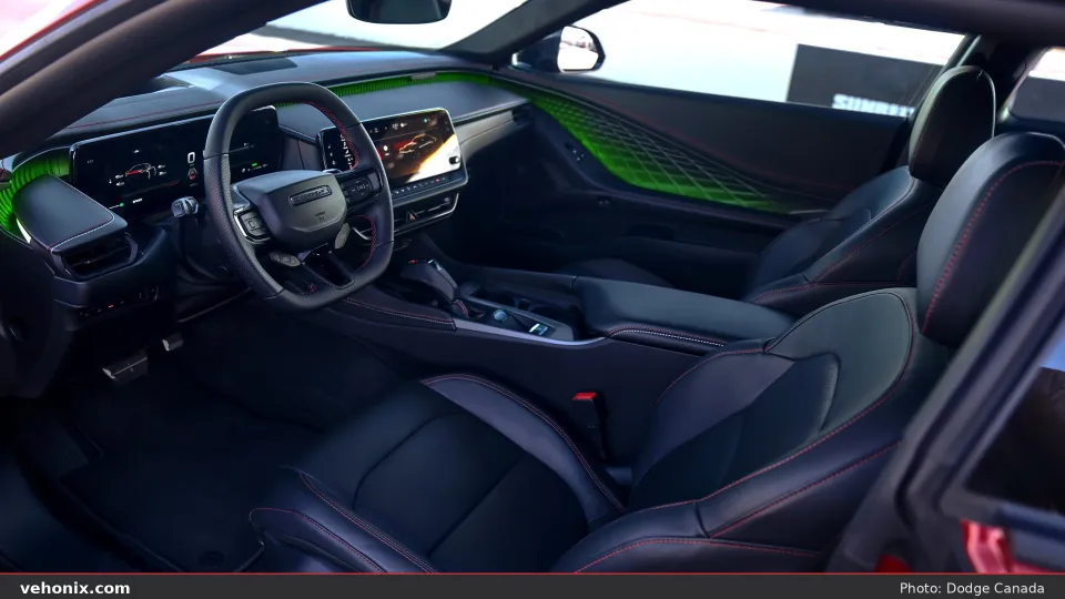 2026 Dodge Charger Daytona R/T front seats, dash and green ambient lighting