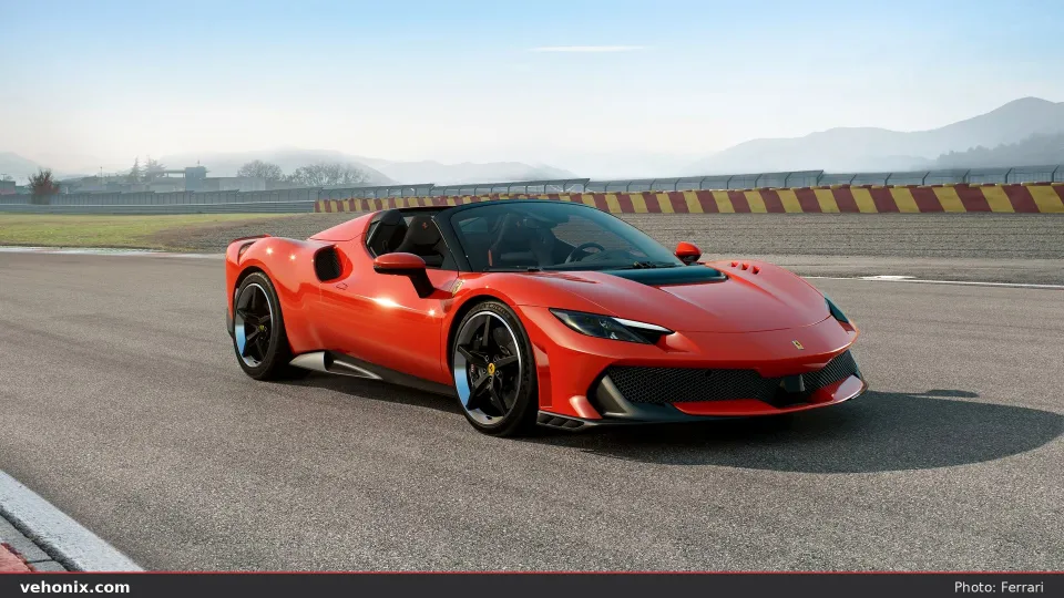 2026 Ferrari 296 Speciale A in orange-red, front three-quarter on track