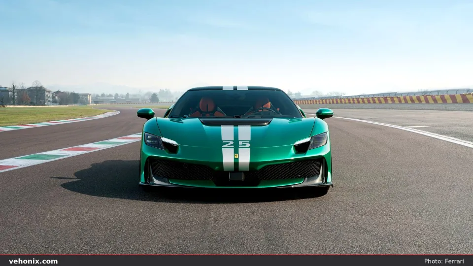 2026 Ferrari 296 Speciale in green with white stripes, head-on track view