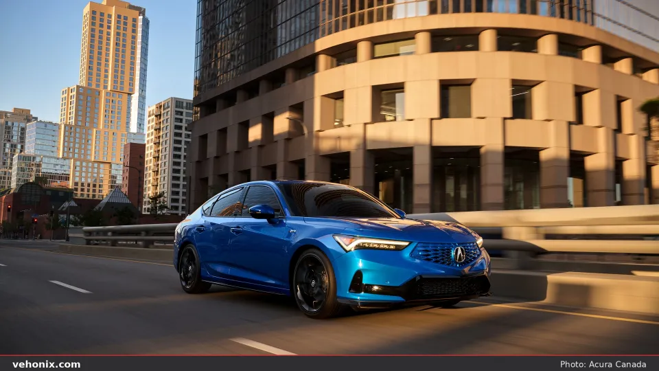 2026 Acura Integra A-SPEC in blue, front three-quarter view on a city street
