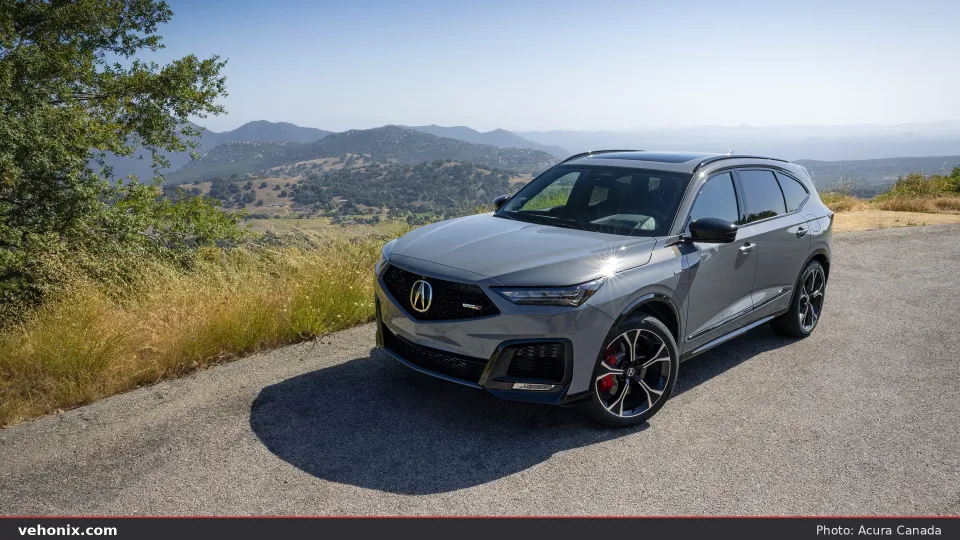 2026 Acura MDX SH-AWD Type S in grey, front three-quarter view parked at a scenic overlook