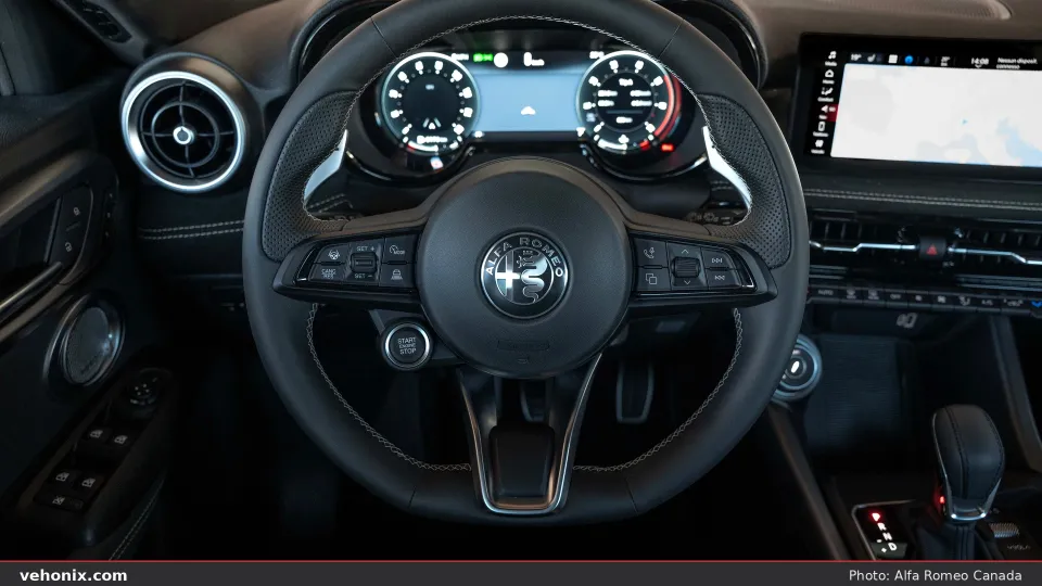 2026 Alfa Romeo Tonale Sport Speciale driver cockpit with steering wheel and dual screens