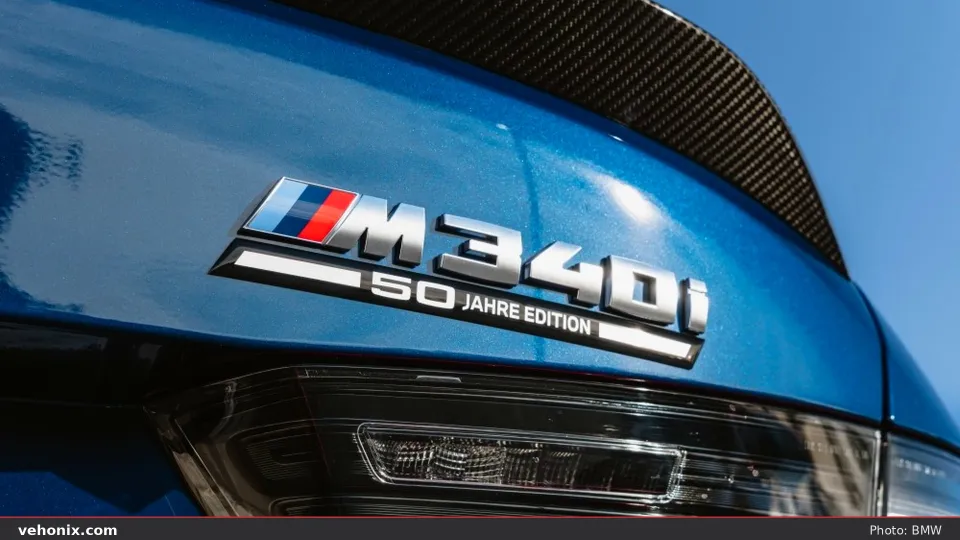 2026 BMW M340i xDrive in blue, front three-quarter