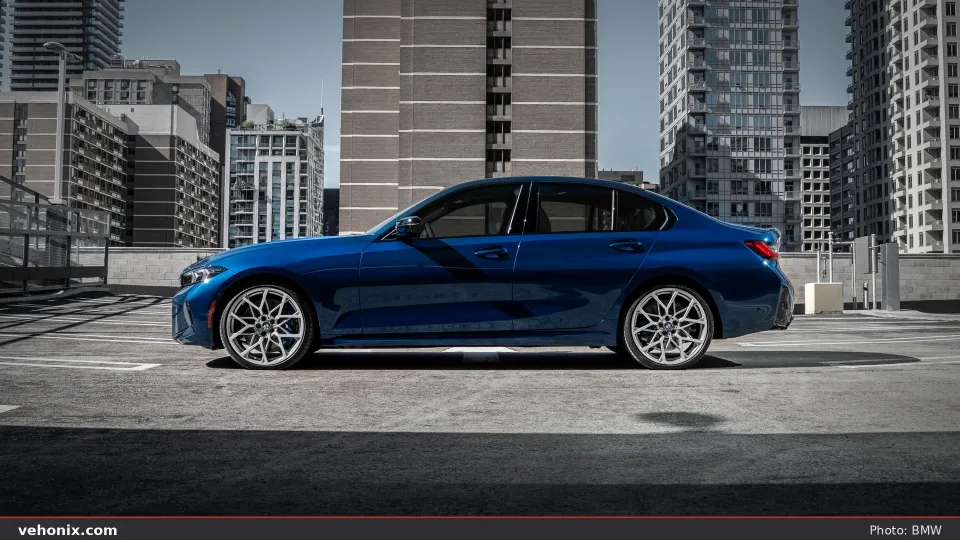 2026 BMW M340i xDrive in blue, front three-quarter