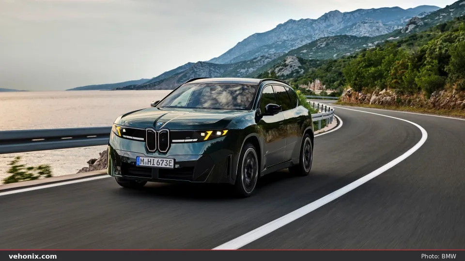 2026 BMW X5 M60i xDrive in blue, exterior view