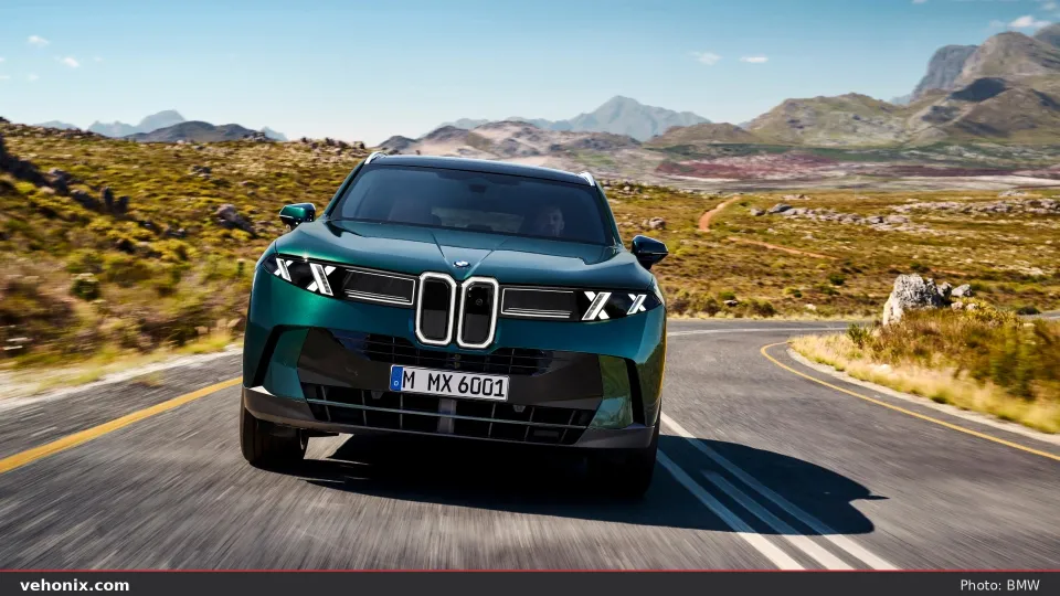 2026 BMW X5 xDrive40i in orange, exterior view
