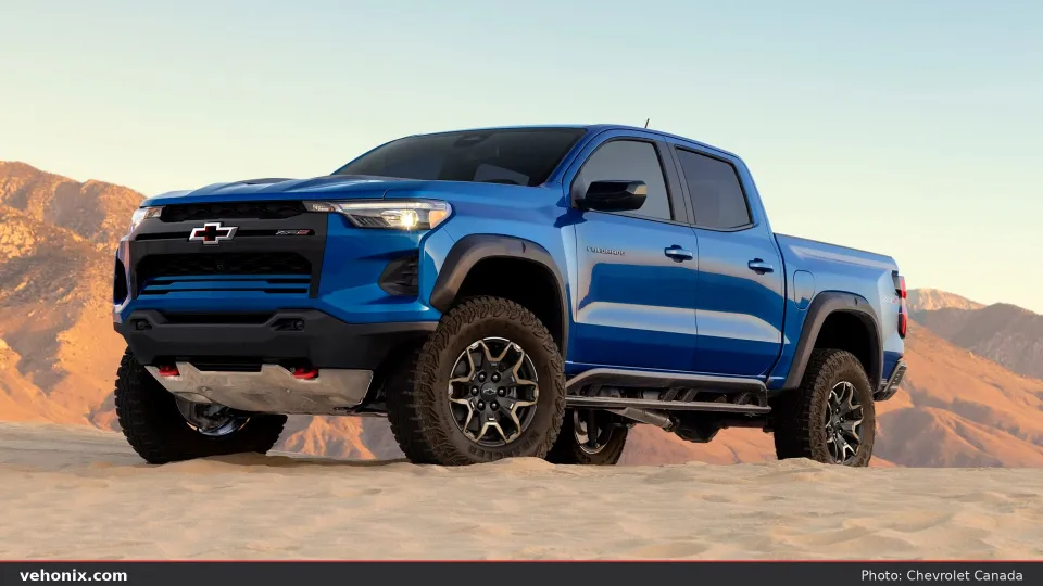 2026 Chevrolet Colorado ZR2 Bison in blue, front three-quarter view in the desert