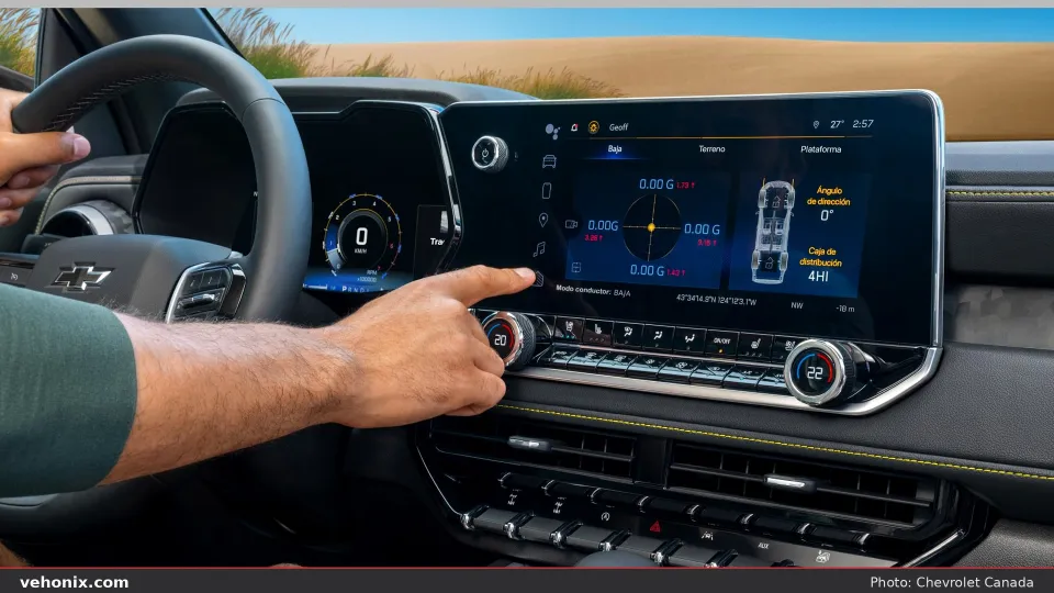 2026 Chevrolet Colorado ZR2, driver using the centre touchscreen