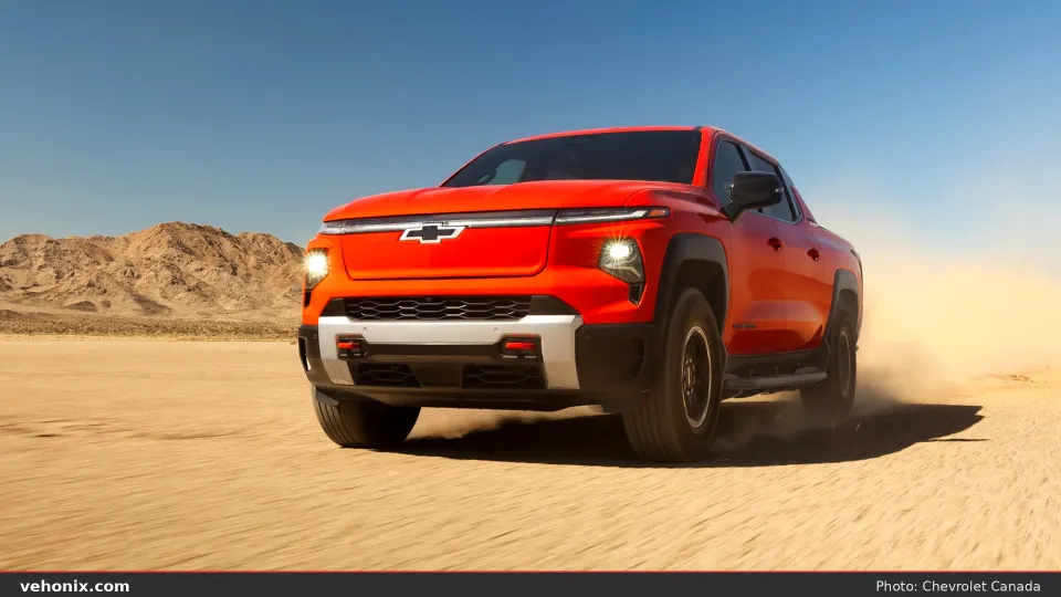 2026 Chevrolet Silverado EV WT in red, front view in the desert