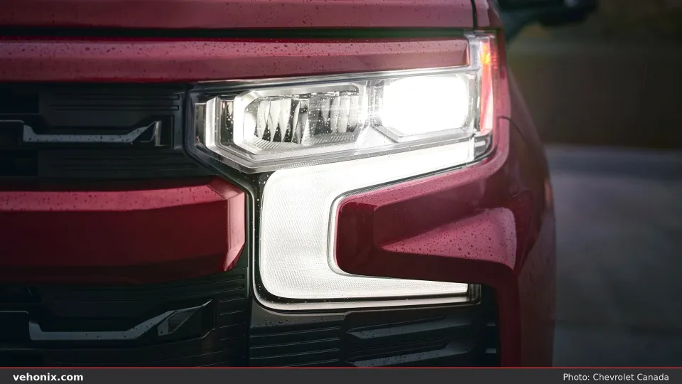 2026 Chevrolet Silverado FFV in red, headlight detail