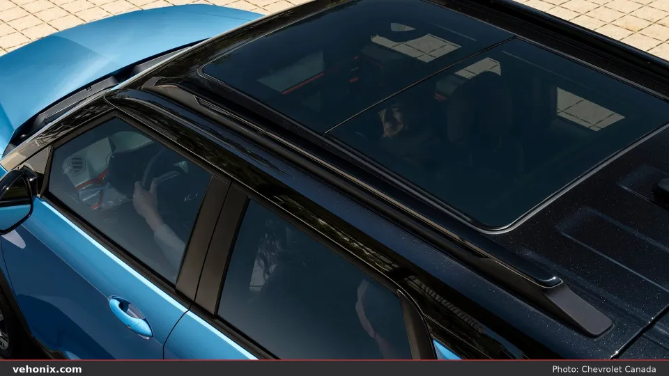 2026 Chevrolet Trailblazer in blue with black roof, high-angle sunroof view