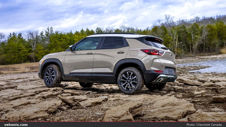 2026 Chevrolet Trailblazer in beige, rear three-quarter view off-road