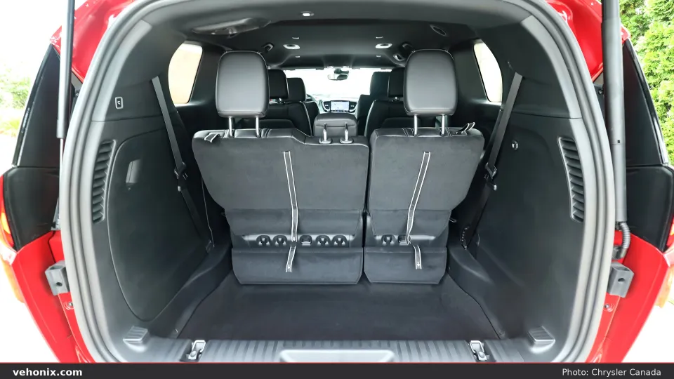 2026 Chrysler Grand Caravan rear cargo area with open liftgate and upright third-row seats