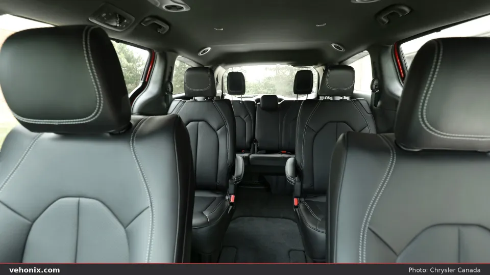 2026 Chrysler Grand Caravan cabin looking aft at black second- and third-row seats