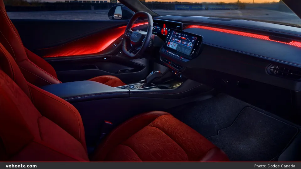 2026 Dodge Charger Daytona Scat Pack cabin with Attitude Adjustment lighting and red seats