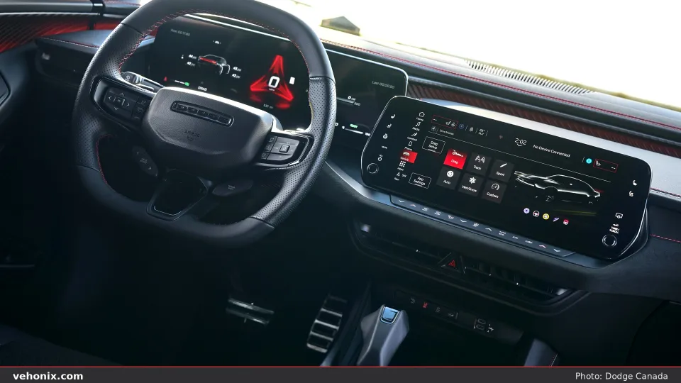 2026 Dodge Charger Daytona Scat Pack dash with digital cluster and center touchscreen