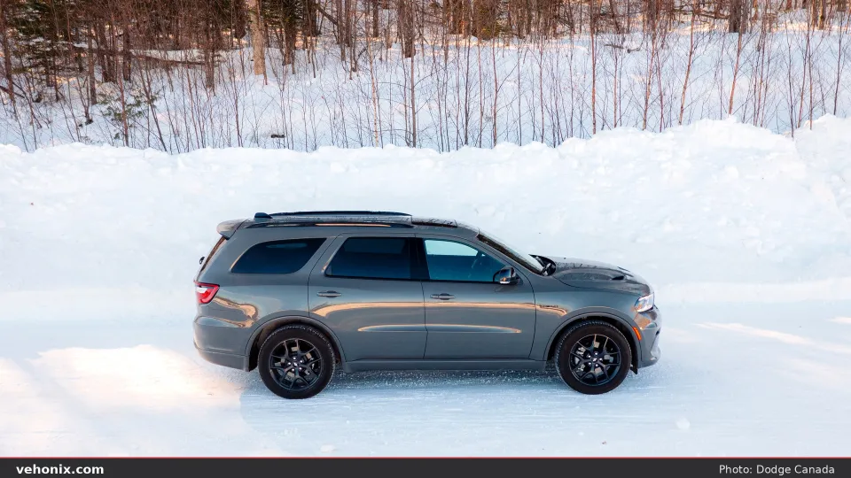 2026 Dodge Durango GT HEMI AWD in grey, full side profile on snow