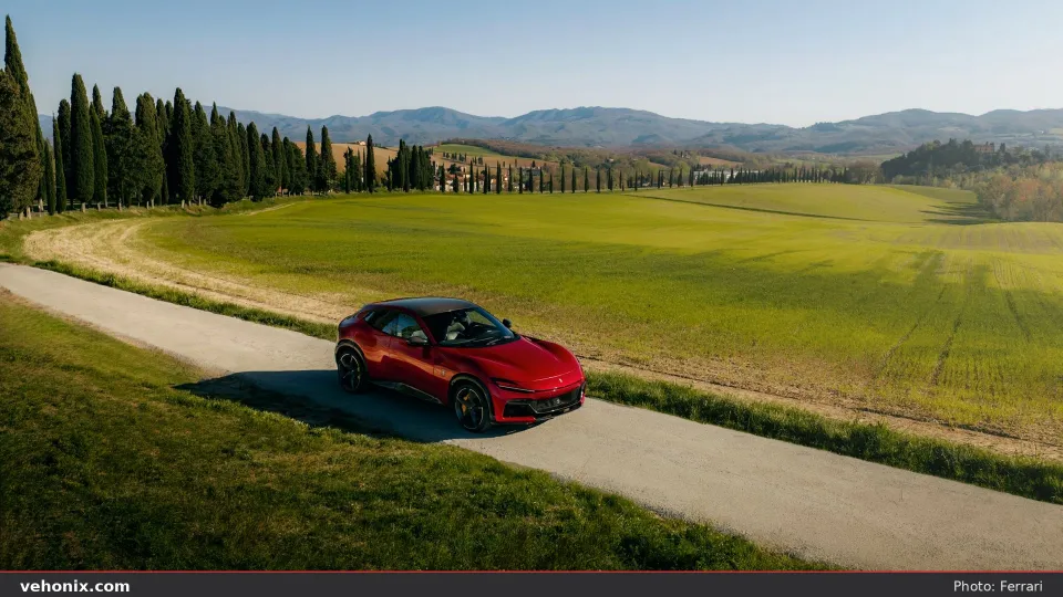2026 Ferrari Purosangue Handling Speciale in red, high-angle landscape view