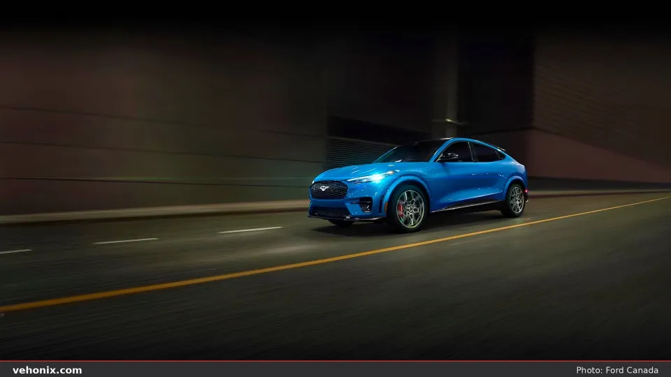 2026 Ford Mustang Mach-E® GT model being driven on a city street