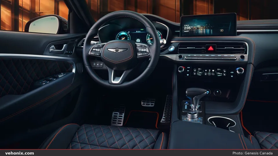 2026 Genesis G70 cockpit in black leather with red stitching and rotary shifter