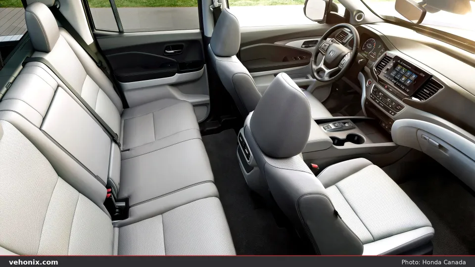 2026 Honda Ridgeline grey leather cabin looking forward over front and rear seats